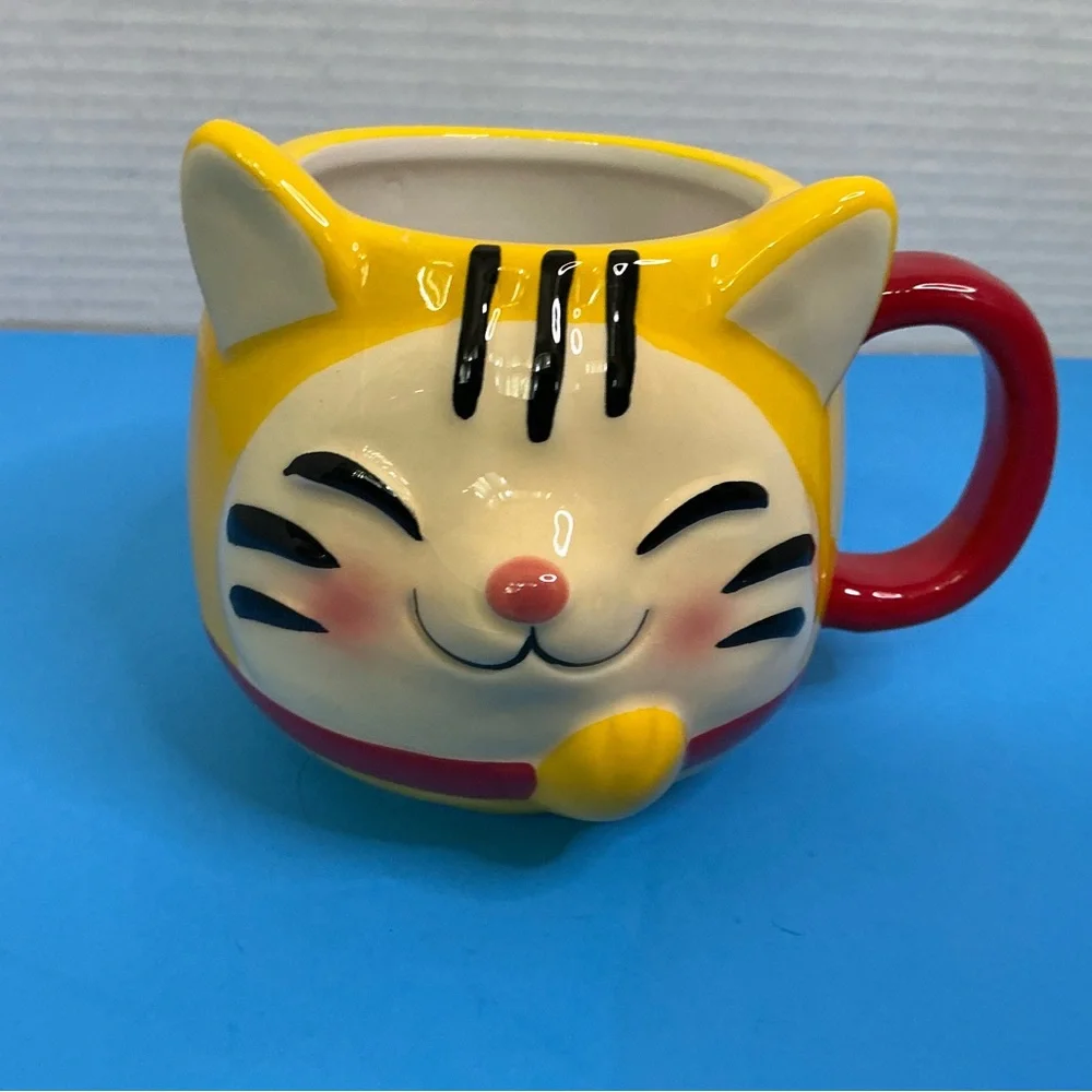 Playful Yellow Cat Face Ceramic Mug with Red Handle